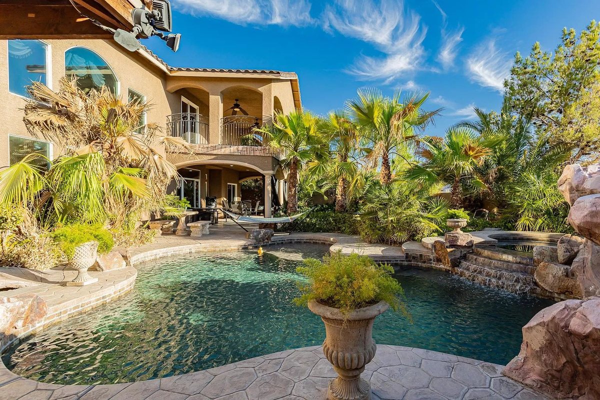 Private backyard with hot tub at the Luxury Desert Oasis furnished home in North Las Vegas