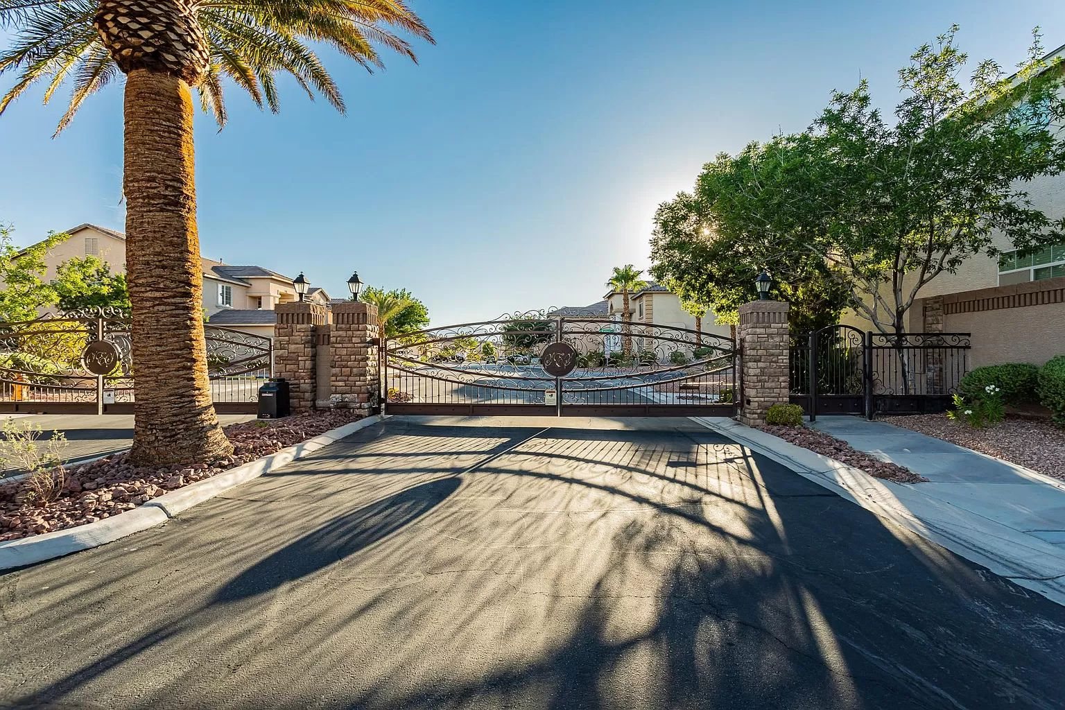 Private tropical backyard event venue with turf and palms in Las Vegas