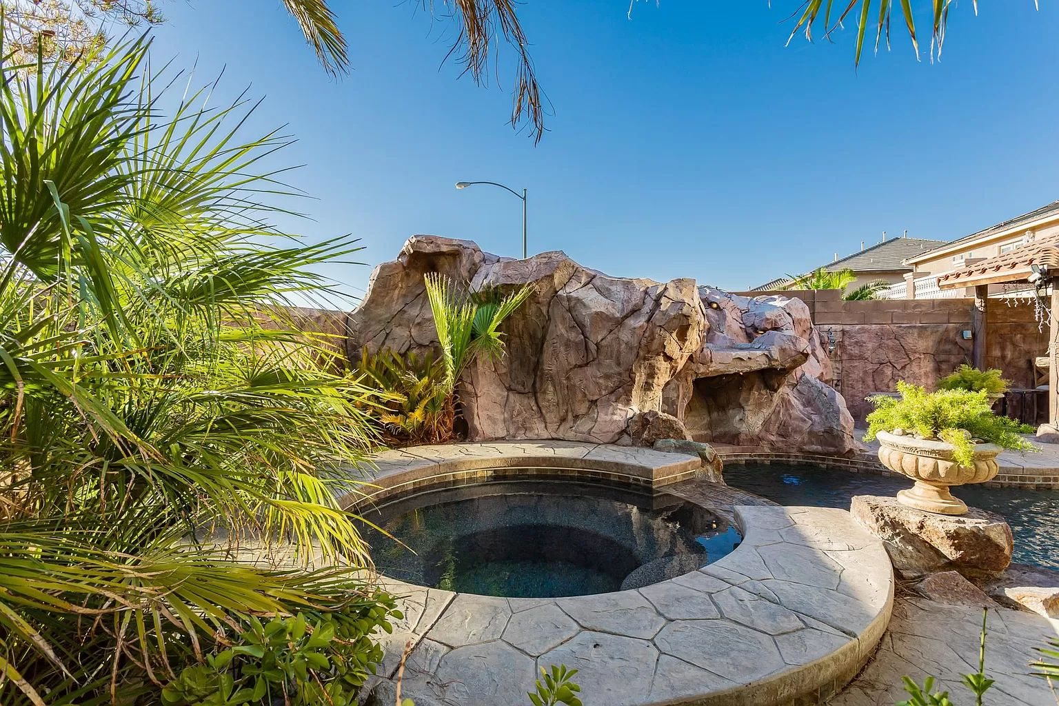 Pool and spa with rock waterfall